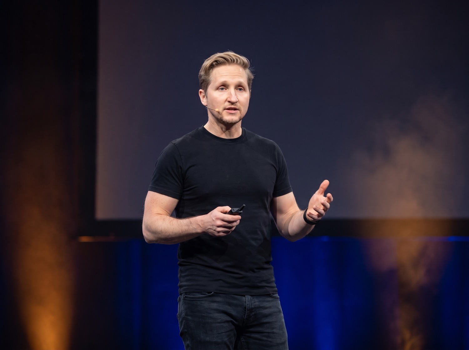 Nathan Newberry speaking on stage